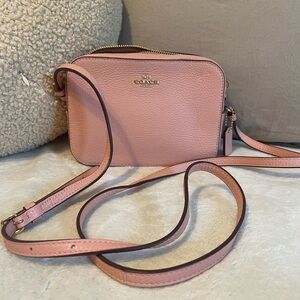 Coach Pink Crossbody Bag with Minimalist Design